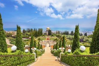 Bahai World Center. The descent to the Mediterranean Sea. Magnificent colonnade with a gilded dome