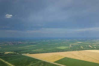 Aerial view of agricultural fields. Cloudy countryside, Aerial view