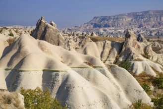 Rock formations of mountain ridges, valleys and pinnacles at Göreme National Park, Cappadocia,