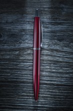 Pen on vintage wooden board