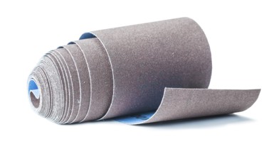 Rolled sandpaper abrasive tools isolated on white