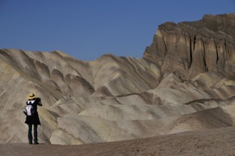 Hikers at Zabriskie Point in Death Valley National Park, California, USA, North America