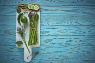 Healthy food vegetables for heart heath on wooden turquoise background