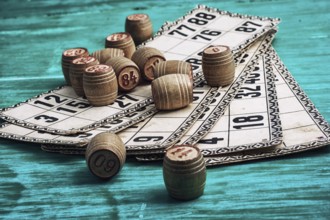 Traditional legacy of the ancient Board game Lotto on wooden background