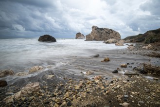 Seascape with windy waves during stormy weather at the rocky coastal area of the Rock of Aphrodite