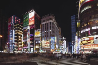 Shinjuku, Japan, May 18 2019: Neon signs illuminate Tokyo's busy Shinjuku neighborhood at night