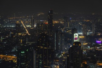 A picture of the Bang Kho Laem and Sathon districts of Bangkok at night