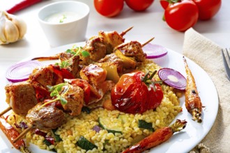 Kebabs with vegetables and bulgur
