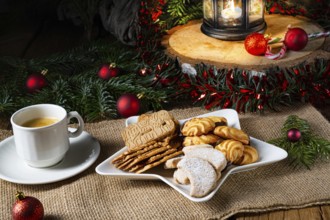 Different types of biscuits with rustic Christmas decorations