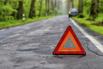 Damaged car on a country road after a breakdown