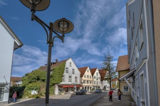 Pointed gable houses and street lantern in Marktstraße, Bad Wurzach, Allgäu, Baden-Württemberg,
