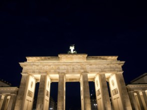 Brandenburg Tor illuminated from a distance at night, magnificent sight, Berlin, Germany, Europe