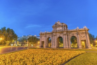 Madrid Spain, night city skyline at Puerta de Alcala