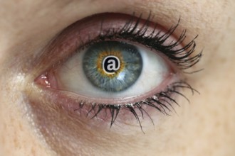 Eye with email sign in the pupil concept
