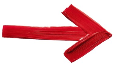 Red arrow with paint on a white background