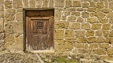 Closed Old Traditional Window on an Old Wall