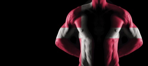 Denmark flag on muscled male torso with abs, black background