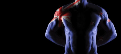 New Zealand flag on muscled male torso with abs, black background