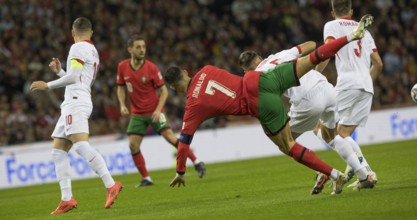 Football match, captain Cristiano RONALDO CR7 Portugal centre has just been fouled and goes down,
