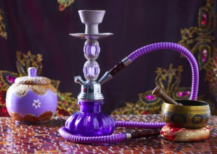 Hookah shisha smoke and singing bowl tibetan