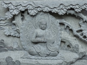 Wall relief depicting Buddha, Kek Lok Si Temple, George Town, Penang, Malaysia, Southeast Asia,