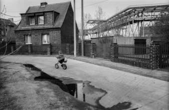 Germany, Greppin, 31 March 1992, village between Wolfen and Bitterfeld, child playing in the