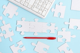 Building An Unfinished White Jigsaw Pattern Puzzle With Missing Last Piece