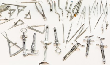 Dental instruments for stomatology practice. Tweezer, carver, wiper, drill, pincers, scraper,