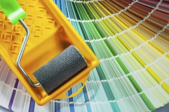 Paint roller tray color sampler on white background