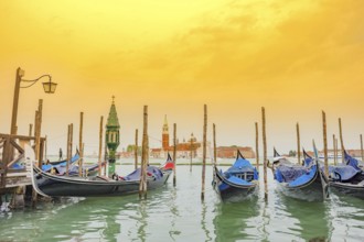Gondolas near Saint Mark Square (Piazza San Marco) and church of San Giorgio di Maggiore in the