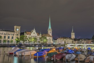 Zurich Switzerland, night city skyline at Fraumunster Church and Munster Bridge