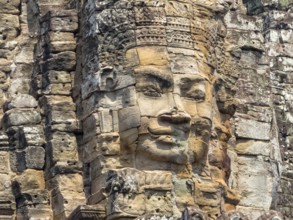 One of many stone faces of Angkor Thom, Siem Reap, Cambodia, Asia