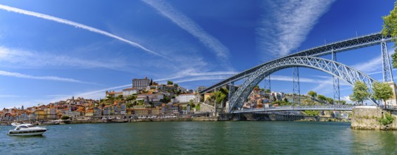 Panorama of the riverbank of Ribeira District and Dom Luis I Bridge in Porto, Portugal, Europe
