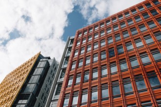 London, UK, August 27, 2023: Low angle view of modern and colorful apartment and office buildings