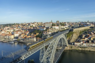 Porto City, Douro River and Dom Luis Bridge I with Tram in Morning. View from Tourist Viewpoint