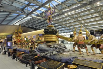 Group of figures from Thai mythology Scene of the Churning of the Milk Ocean in the departure area