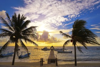Riviera Maya sunrise pier in Caribbean Mayan Mexico