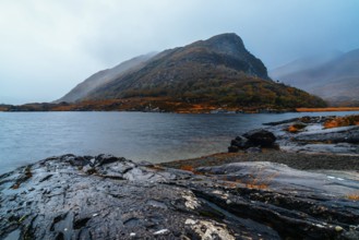 Scenic view of lake against mountian in Killarney National Park a misty day in the Ring of Kerry in