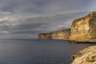 A view of the Xlendi Bay cliffs on the coast of Gozo Island in Malta