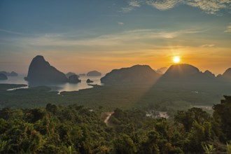 Tropical islands sunrise view at Samed Nang Chee viewpoint with bay to sea ocean, Phang Nga