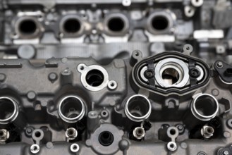 Close up of the engine (motor) of a powerful car. Metallic