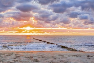 Wonderful sunrise at the beach in summer
