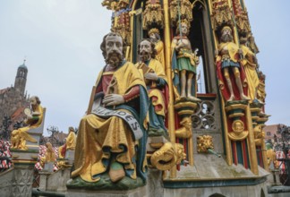 Beautiful fountain on the main market square, tubular fountain with 40 figures from the 14th