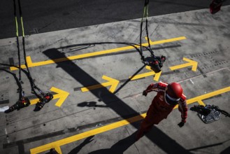 MELBOURNE, AUSTRALIA, MARCH 24: Scuderia Ferrari pit crew before winning the 2024 Australian Grand