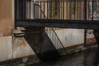 Shadow from a railing, bridge over a canal, Venice, Italy, Europe