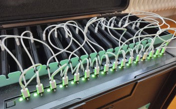 Multiple charger with wired connections and illuminated lights