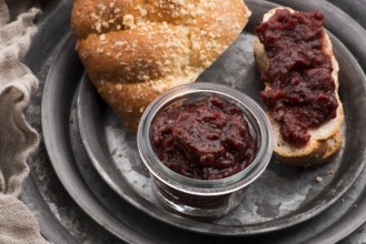 Sweet bread (challah) with cherry jam
