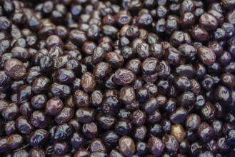 Black olives as health food preserved in olive oil