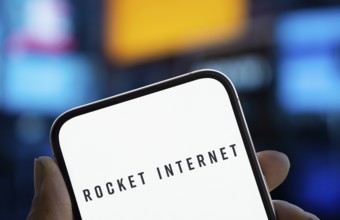 Rocker internet logo is displayed on smartphone. Rocket Internet SE is a German Internet company