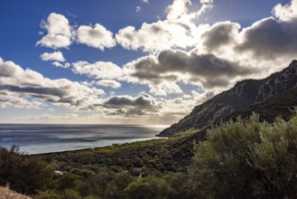 View of the glittering sea and Monte Ferru, Ogliastra, Sardinia, Italy, Europe